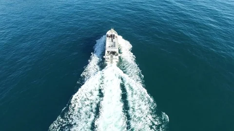 Aerial perpendicular view of a ferry navigating off the coast of Amalfi Stock Footage 72108831