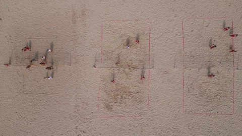 From the aerial perspective, a breathtaking view of beach volleyball unfolds Video stock 247140364