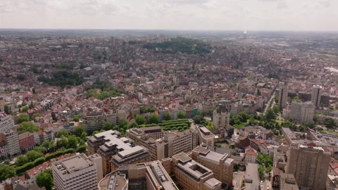 Aerial perspective of Brussels, showcasing a blend of urban development and Stock Footage 302231697