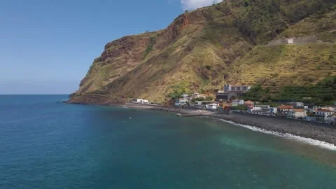 Aerial perspective of calm ocean waters near Paul do Mar, with gentle waves Stock Footage 345621999