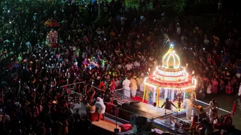 Aerial perspective captures floating chariot during Masimagam Theppa Thiruvizha Video stock 332147959