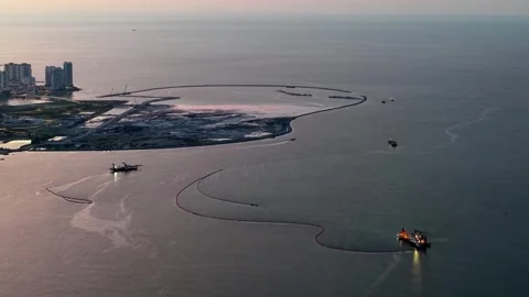 Aerial perspective captures ship at reclamation site near Andaman Island Видео 329365985