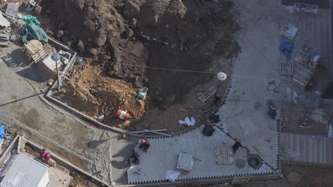 Aerial Perspective of Construction Workers at Work on the Job Site Vidéo 303820956