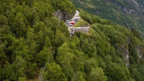 Aerial perspective of a curved mountain road with pullout parking area nestle Stock Photos