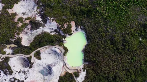 Aerial perspective of the Devil's Bath geothermal lake in Rotorua, Bay of Stock-Footage 342727219