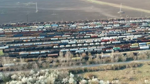 Aerial perspective ,  flying along large industrial train depot Stock-Footage 105290856
