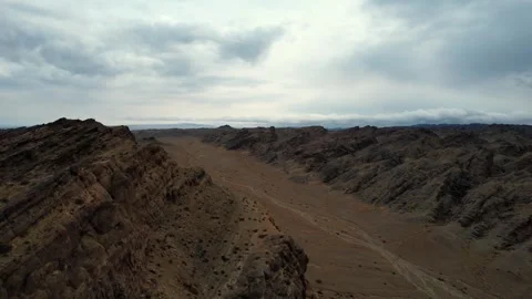 Aerial Perspective Of Folded Rock Formations Desert, Noyon Uul, Mongolia Stock Footage 333554460