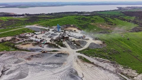 Aerial perspective of granite quarry infrastructure 動画素材 338222461