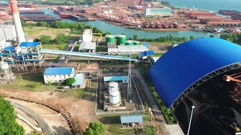 Aerial Perspective of a Large-Scale Coastal Industrial Port Supporting Bulk.. Stock Footage 326181272