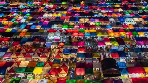 Aerial Perspective of Multi-Colored Vendor Tents at Ratchada Train Market Stock Footage 334446926