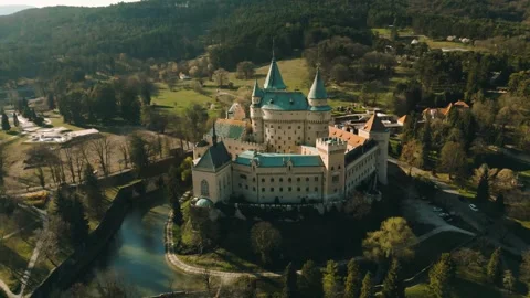 Aerial perspective panoramic view of Bojnice Castle, famous historic palace in Stock Footage 277549311