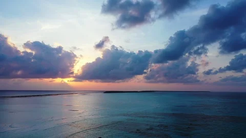 Aerial perspective of a purple dramatic sunset above Hawaii. showing some Stock Footage 111409832