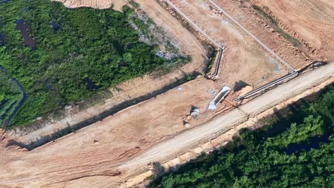 Aerial perspective reveals construction site 스톡 동영상 344047471