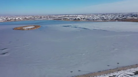 Aerial Perspective of Snow-Dusted Clay Architecture in Khiva Stock Footage 345817015