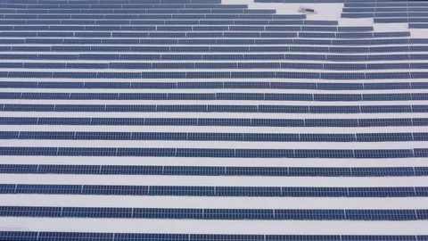 Aerial perspective Solar panel farm Green Energy at winter snow sunny day Stock Footage 127778298