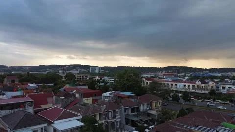 Aerial perspective of a sprawling community at dusk, with terracotta roofs .. Video stock 339039353
