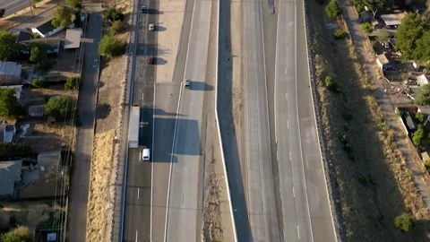 Aerial Perspective Traffic Flow on a Multi-Lane Highway, Carriage Trucks Stock Footage 329969235