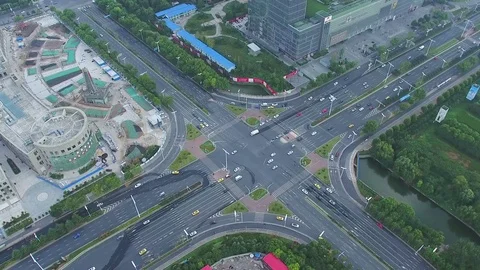 Aerial perspective of traffic at roadway intersection in nanjing city Stock Footage 74397710