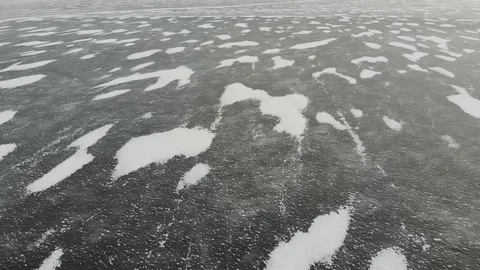 Aerial Perspective View of Beautiful Ice Textured Frozen Baikal Lake Surface Stock Footage 120345698
