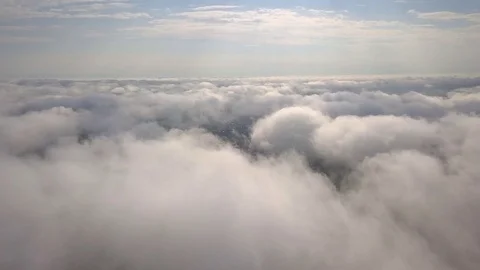 Aerial perspective view of flying over clouds clouds. Stock Footage 111090689