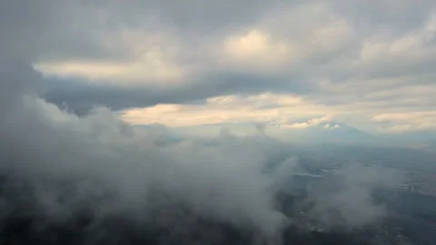 Aerial perspective view of flying over clouds clouds. Stock Footage 145400007