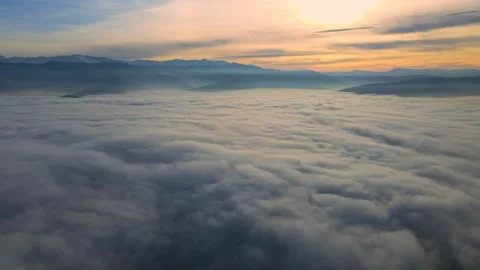 Aerial perspective view of flying over clouds clouds. Stock Footage 145400115