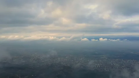 Aerial perspective view of flying over clouds clouds. Stock Footage 145401559