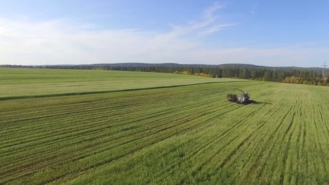 Aerial photography. Cleaning of fields by combines Stock-Footage 80093353