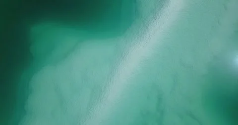 Aerial Photography of Close View of Solid Color Gradient Blue Green Salt Lake at Video stock 337148842