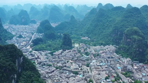 Aerial Photography of Distant View of Ancient Town Tile Roof Houses and Peak 스톡 동영상 337154879