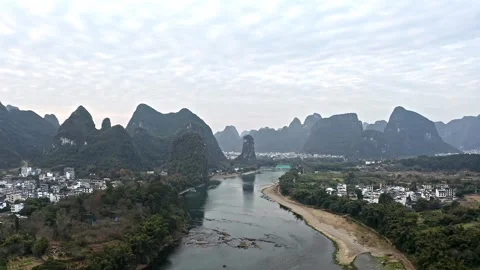 Aerial Photography of Distant View of Deep Li River Valley Village and Peak Video stock 337155706