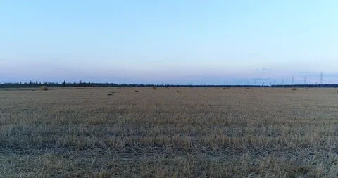 Aerial photography, a large stack of hay or a roll of straw in the field. Video stock 92273873