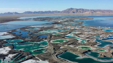 Aerial Photography of Panorama of Complex Multi Color Salt Pond with Distant Video stock 337150357