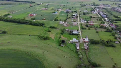 Aerial photography of a village in russia meadows fields Stock Footage