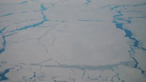 Aerial: plane flying over eastern border of Canada Stock Footage 235650444