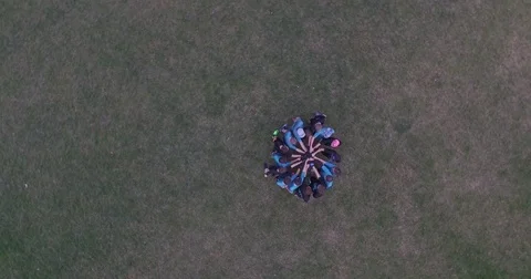 Aerial of player having team huddle in ground 動画素材 77335873