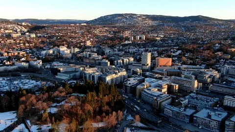 Aerial POI clockwise time lapse city and traffic on e18 highway in Oslo, Norway Stock Footage 104930971