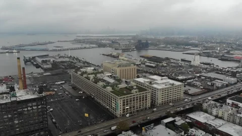 Aerial Point of Interest Flight View of Industry City, Port, and Urban Landscape Stock Footage 249797106