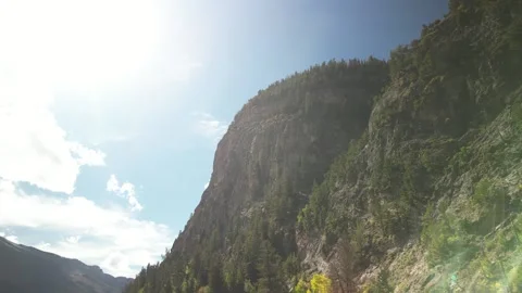 Aerial pointed up at tall mountain with fall colors in Marble Colorado Stock Footage 251091981