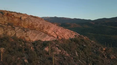 Aerial pop up over a desert mountain with Saguaro cactus Stock Footage 99453053
