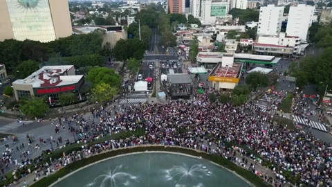 Aerial Pride Parade 2026 at Minerva Roundabout, Guadalajara City View Stock Footage 337181724