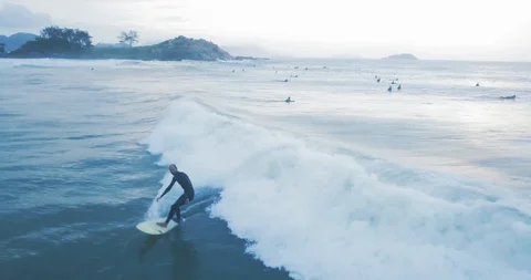 Aerial Professional Surfer Catching a Wave on the Sea in Brazil, Florianópolis Vídeo Stock 101554552
