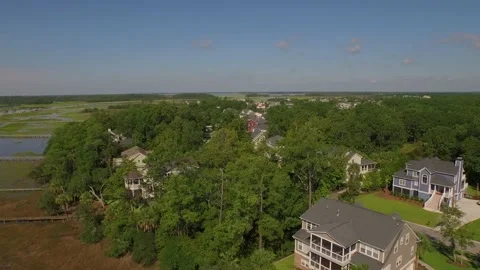 Aerial of property by a marsh Stock Footage 167372066
