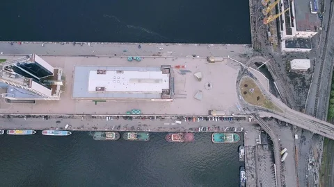Aerial of protruding rectangular quay with hotels and ships in Odessa in summer Stock Footage 99307096