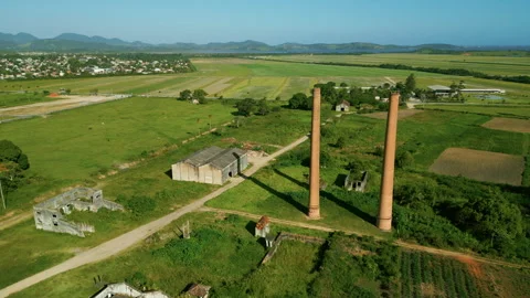 Aerial pull-away of abandoned sugar mill in Saquarema, Brazil: historic ruins Stock Footage 325499109