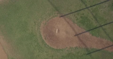 Aerial Pull Away From A Baseball Pitcher's Mound Reveal Stock Footage 65202520