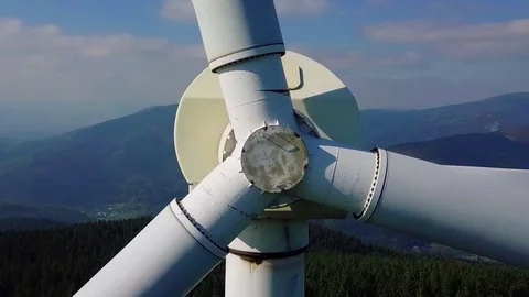 Aerial Pull-Away from Large Wind Turbine Stock Footage 114889547