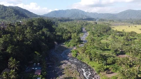 Aerial Pull Away of River and Mountains in Sidemen Bali Stockbeeldmateriaal 333169790