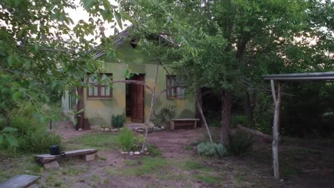 Aerial Pull Away from Rustic Eco House - Drone Shot Stock Footage 330889721