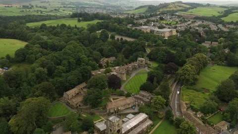 Aerial pull away view of Skipton Castle in Yorkshire Stock Footage 292124684